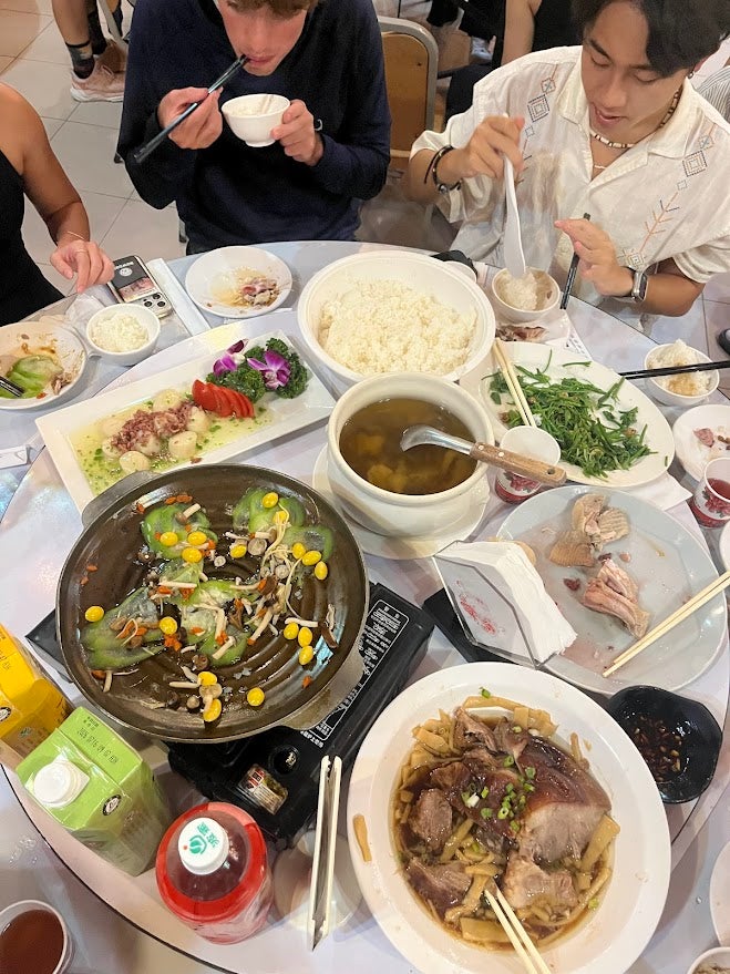 A shared pot with a family-style meal